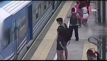 Genç kadın tren gelirken iki vagonun arasına düştü