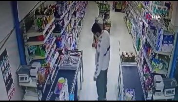 Adana'da satırlı, bıçaklı gaspçıyı market çalışanı kovaladı