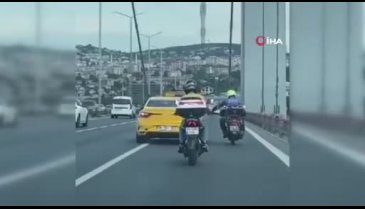 İstanbul'da 15 Temmuz Şehitler Köprüsünde taksi ile motosikletli kavgası