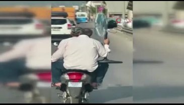 Bursa'da trafikteki klimalı bisiklet kamerada