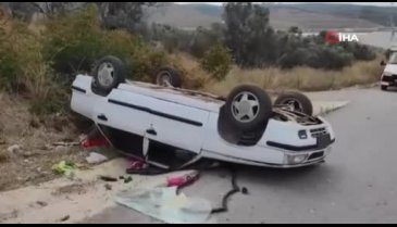 Bursa'da otomobil takla atarak yol kenarına devrildi!