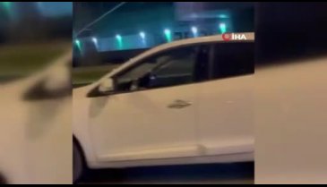Bursa'da ilginç görüntü: Ayağını camdan sarkıtarak araç sürdü!