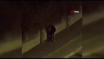 Tartıştığı kadını sokak ortasında sürükleyen şahıs kamerada