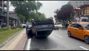 Bursa'da park halindeki otomobile çarptı, takla attı