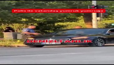 Polis ile iş insanı trafikte yumruk yumruğa kavga etti