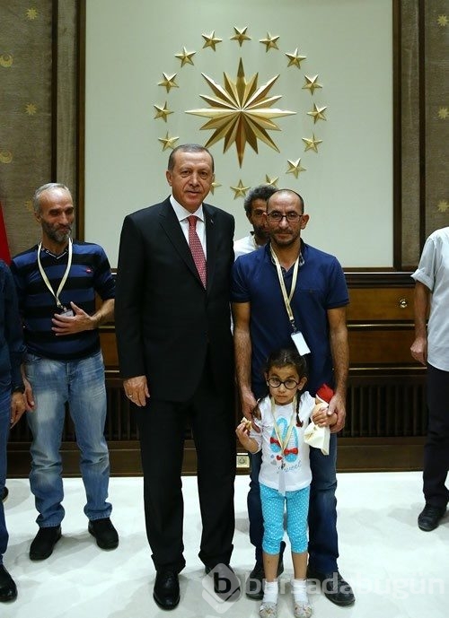 Erdoğan, 16 Türk işçiyi ve ailelerini ağırladı