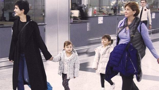 Tuba Büyüküstün ikizlerle Paris'e uçtu