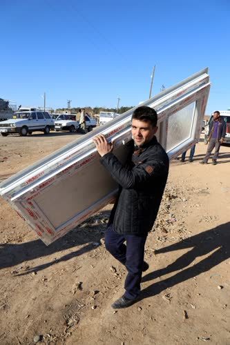 Suriyelilere Türk nakliyeciler de "omuz veriyor"
