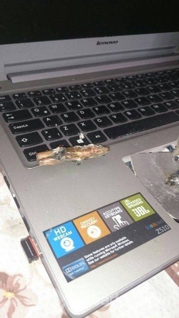 Teröristin kurşunu şans eseri laptopa denk geldi