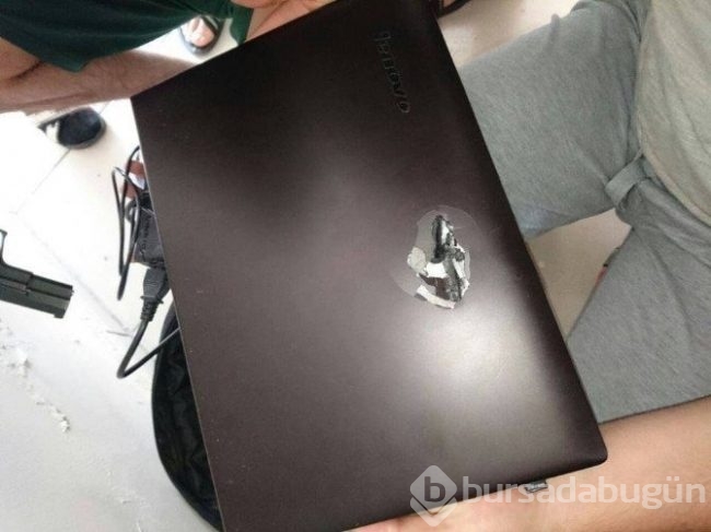 Teröristin kurşunu şans eseri laptopa denk geldi