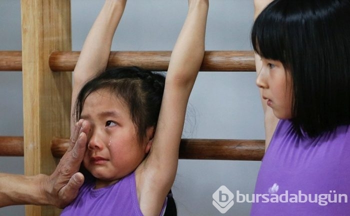 Çin'in "şampiyon sporcu fabrikaları"ndan düşündüren görüntüler