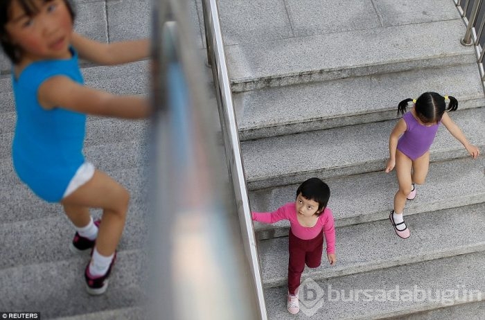Çin'in "şampiyon sporcu fabrikaları"ndan düşündüren görüntüler