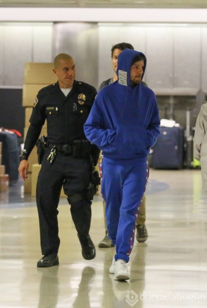 Louis Tomlinson kadın hayranını darp etti!