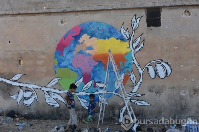 Türk grafiti sanatçıdan Suriye'de anlamlı çizimler