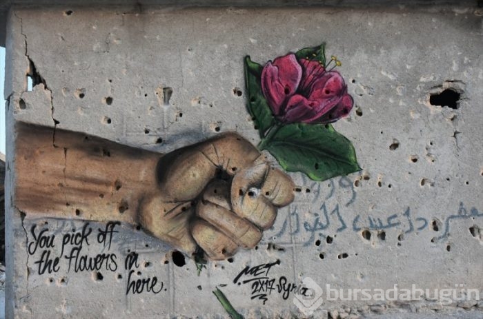 Türk grafiti sanatçıdan Suriye'de anlamlı çizimler