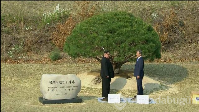 Kim sınırı geçti, iki kore lideri