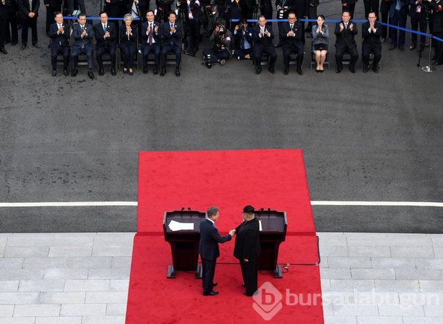 Kim sınırı geçti, iki kore lideri