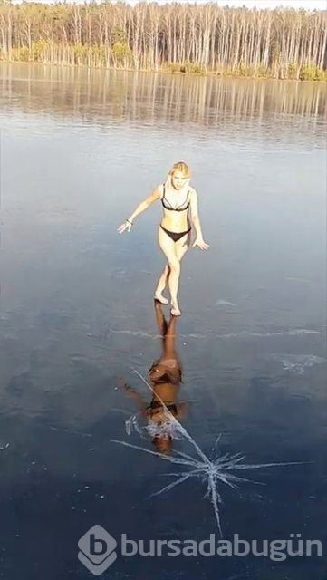 Donmuş göle atlayan Rus kadın bacağını kırdı
