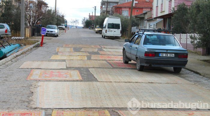 Üzerinden araba geçen halıların değeri artıyor
