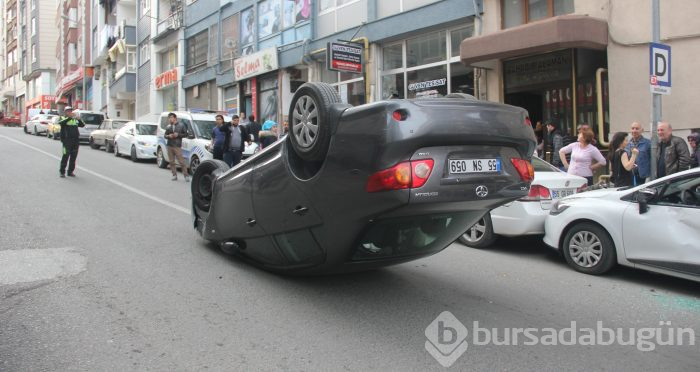 Takla atan otomobilden burnu bile kanamadan kurtuldu
