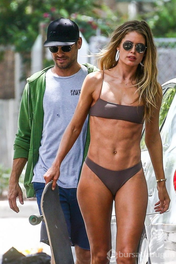 Doutzen Kroes yarı çıplak kaykaya bindi!

