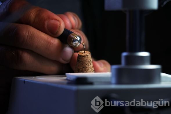 İncir çekirdeğine İhlas suresini yazdı
