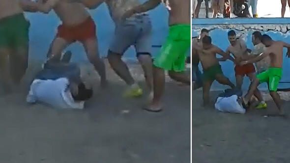 Bankta oturan eşini dövdüler