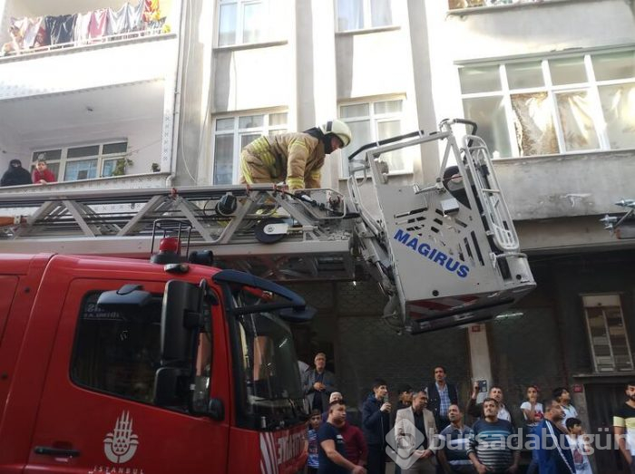 Yangında mahsur kalan kadın itfaiye ekipleri tarafından kurtarıldı