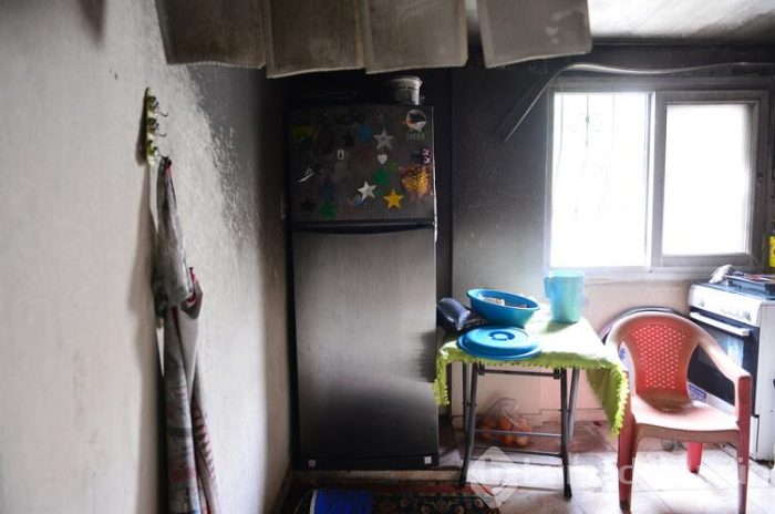 Evi yanan anne gözyaşlarına boğuldu