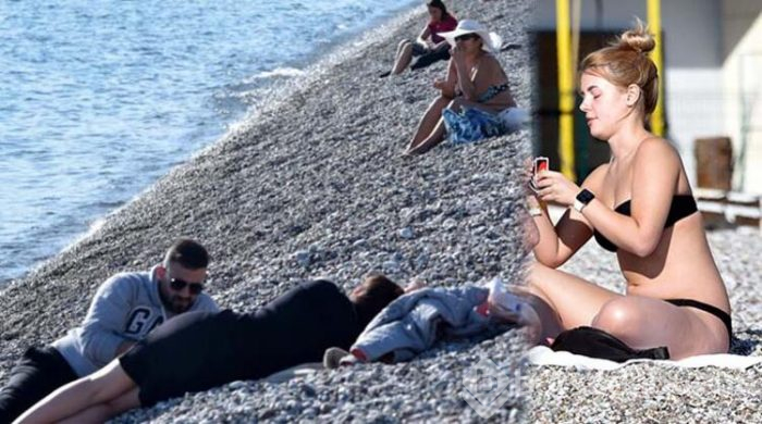 Antalya'da güneşli havayı fırsat bilenler denize girdi