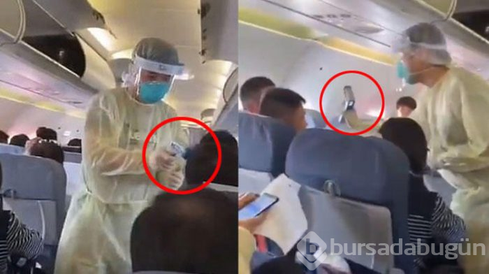Çin'deki uçakta yolculara virüs taraması yapıldı
