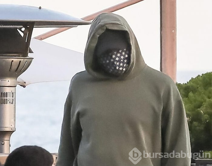 Leonardo DiCaprio objektiflerden böyle gizlendi