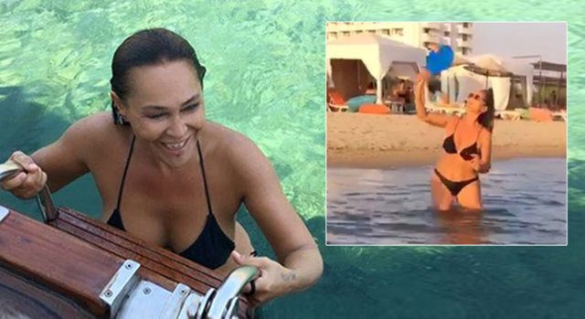 Hülya Avşar balkonda egzersiz yaptı