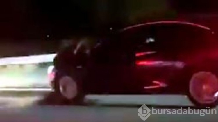 40 kilometre boyunca eşini kaput üzerinde götüren koca tutuklandı