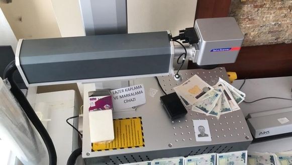 Sahte pasaport üreten şebekeye baskın