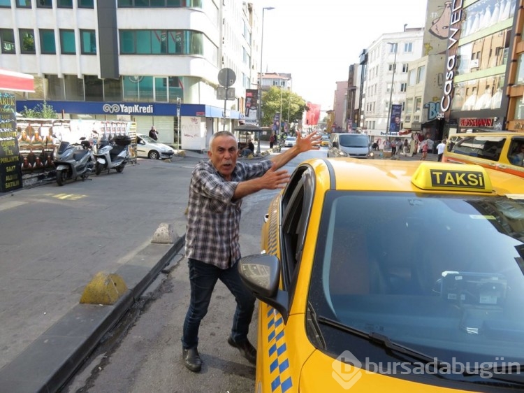 Cezaya sinirlenen taksici aracını yumrukladı