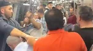 Metroda 'tükürük' kavgası! Bir anda boks ringine döndü