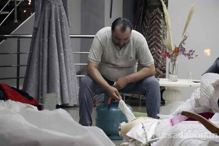 Dükkanında ki gelinlikleri yakmaya çalıştı! İtfaiye ekibi müdahale etti