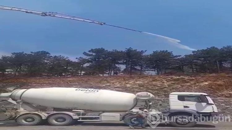 Beton arabasıyla alevlere su sıktılar!
