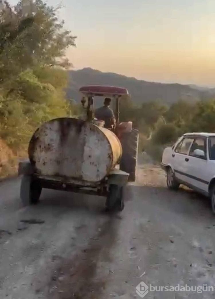 Yangın bölgesine patlak lastikle su taşıdı