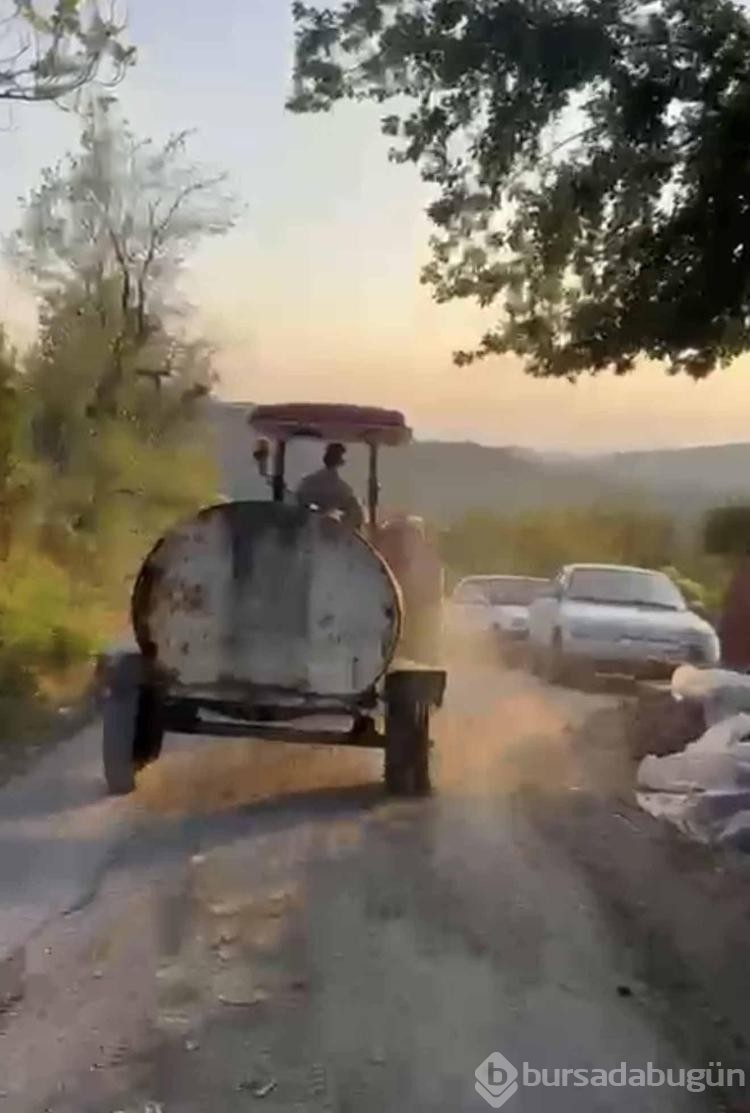 Yangın bölgesine patlak lastikle su taşıdı
