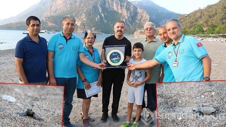 Çıralı'daki çeyrek asırlık gönüllü deniz kaplumbağası koruyucularına plaket