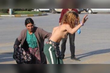 Polise kızdı caddede soyundu!
