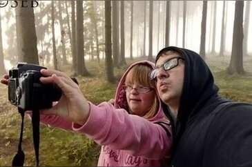 Down sendromlu kızıyla fotoğraf rekabetine giren baba