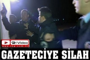 HAVAALANINDA GAZETECİYE SİLAH &Ccedil;EKTİ