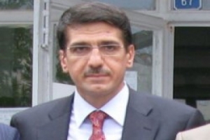 AKP'Lİ VEKİL YANILMAZ TOPRAĞA VERİLİYOR