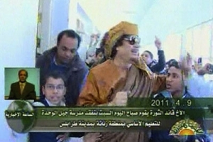 KADDAFİ OKUL ZİYARET ETTİ