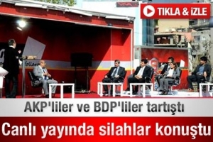 ŞIRNAK'TA CANLI YAYINDA SİLAHLAR &Ccedil;EKİLDİ