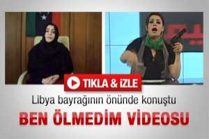 Libya bayrağının &ouml;n&uuml;nde konuştu