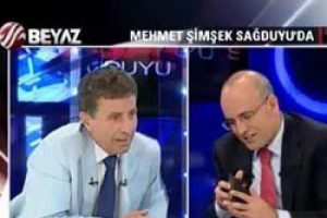 Bakan Şimşek canlı yayında c&uuml;zdan &ccedil;ıkardı
